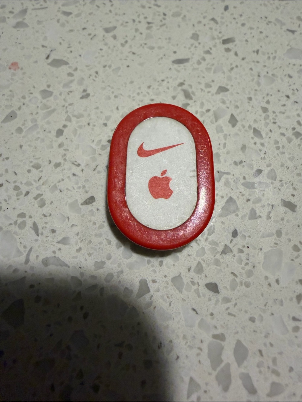 Apple Red Oval Phone Grip with Nike and Apple Logos